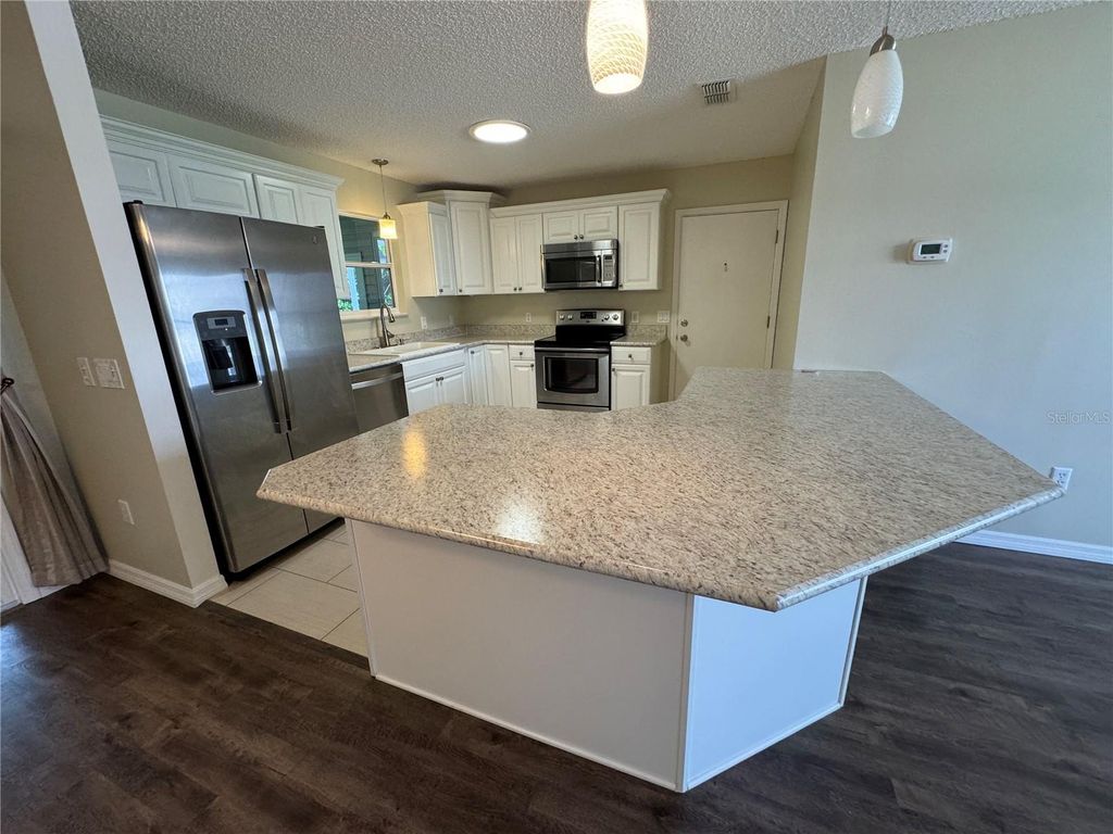 Photo of 2013 Cristo Road, Lady Lake, FL 32159 (MLS # G5103415)