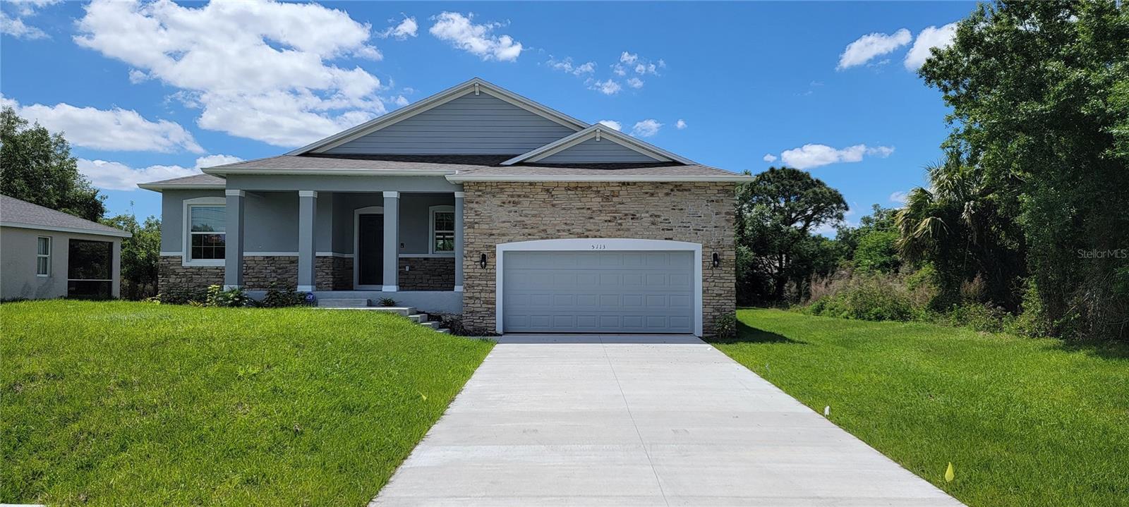 Price reduced for quick sale!! Welcome to North Port, the largest city in Sarasota County, known for its rich natural beauty, world-class beaches, arts and culture, and exciting spring training baseball. With its abundance of parks and the scenic Myakka State Forest, North Port offers residents a lifestyle filled with outdoor adventures and recreational opportunities. The city’s ideal location also provides easy access to shopping, dining, and top-rated schools, making it the perfect place to call home.
Introducing a MUST SEE...the Clearwater! Designed with both comfort and efficiency in mind, this beautiful home offers a perfect balance of function and style.
The exterior of this home greets you with a charming stone-accented front elevation, a covered entryway, and a decorative masonry finish, adding a touch of elegance from the very first step. Upon entering, you're immediately welcomed into a bright and airy open floor plan that creates a seamless flow throughout the home. The expansive flex space offers endless possibilities, whether you're looking for a home office, playroom, or additional living area, and it leads into the heart of the home—a beautifully designed kitchen. The kitchen is outfitted with soft-close shaker cabinets and cabinet crown molding, adding a custom touch, and is complemented by ceramic tile flooring throughout the main areas, creating a sophisticated and durable finish. Bedrooms are carpeted for extra comfort.
The layout is thoughtfully designed for privacy, with the guest bedrooms located opposite the master suite, ensuring a peaceful retreat. The large master suite features its own private bath, complete with a walk-in tile shower with shower enclosure, offering both luxury and convenience. A spacious walk-in closet completes the master suite, providing ample storage space.
Blinds are included throughout the home, offering both privacy and light control. Plus, enjoy the convenience of Smart Home features, including a Ring Video Doorbell, Smart Thermostat, and Keyless Entry Smart Door Lock, providing enhanced security and comfort at your fingertips. With its modern design, spacious living areas, high-end finishes, and thoughtful features, the Clearwater offers all the attributes of a custom home at a fraction of the price. Don't miss out on the opportunity to make this stunning home yours!