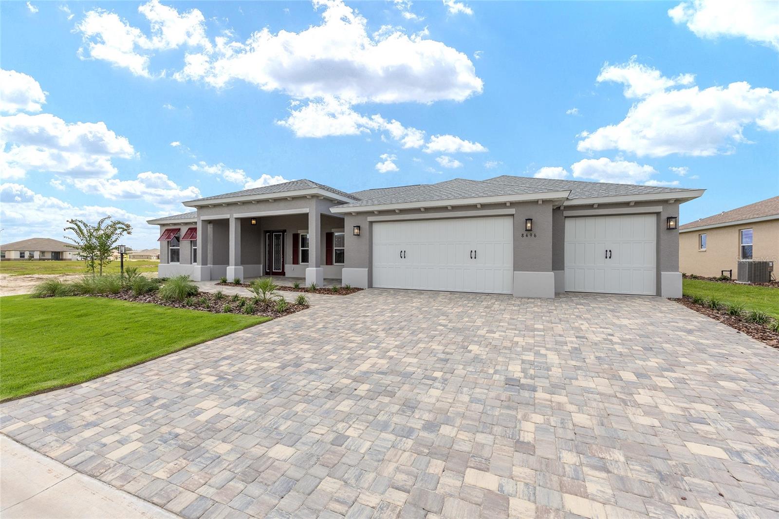 Brand new and move-in ready, this beautiful Brighton model is nestled in the heart of Candler Hills, one of Ocala’s most desirable active adult communities. With 2 spacious bedrooms, 2 bathrooms, and a rare 3-car garage, this home has the perfect blend of style, space, and functionality. The open living room is filled with natural light and flows easily into the cheerful breakfast area, ideal for slow mornings or casual entertaining. A flexible bonus room gives you space to create a home office, craft room, or quiet retreat, and the full laundry suite adds everyday convenience. Thoughtfully designed with comfortable living in mind, this home gives you all the benefits of brand new construction without the wait. Enjoy gated community living with access to world-class amenities, golf, and a lifestyle that's truly one of a kind.