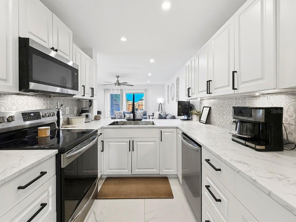 Photo of 417 Georgetown Drive #417, Casselberry, FL 32707 (MLS # O6439775)