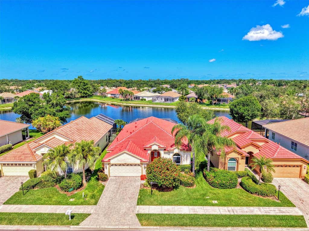Photo of 5153 Highbury Circle, Sarasota, FL 34238 (MLS # A4698015)