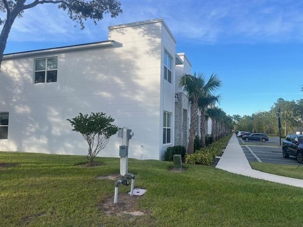 Photo of 1411 Serendipity Lane, Clermont, FL 34714 (MLS # O6359155)