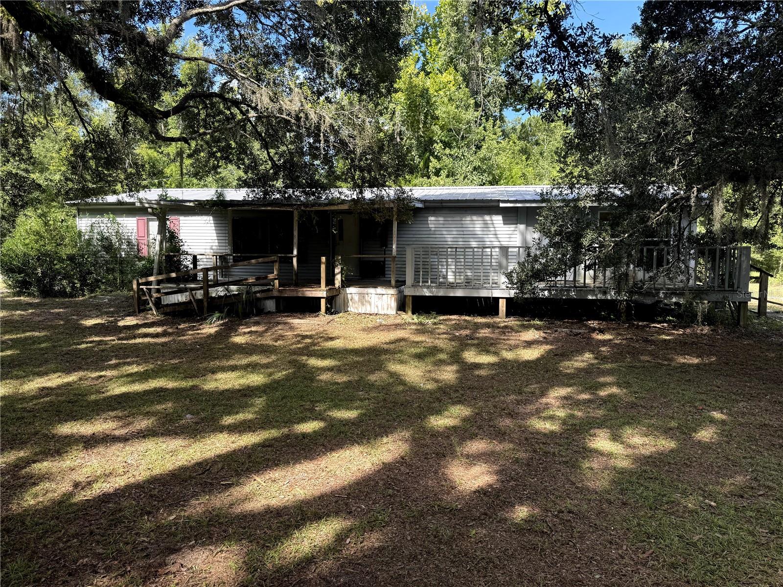THE PRICE IS RIGHT! This 3 bedroom 2 bath home is situated on over an acre of land with a 18X40 detached garage/workshop. The home needs some TLC but the property is priced considerably below market value with lots of potential and affordability combined. Zoned agricultural so bring all of the animals!