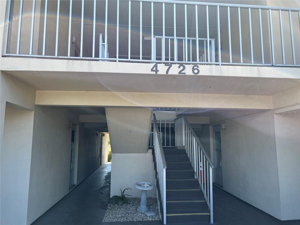 Photo of 4726 Marine Parkway #104, New Port Richey, FL 34652 (MLS # W7875874)