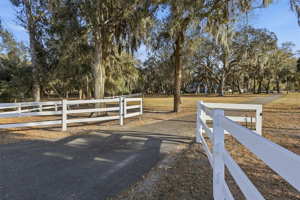 Photo of 6197 Lake Winona Road, De Leon Springs, FL 32130 (MLS # V4947408)