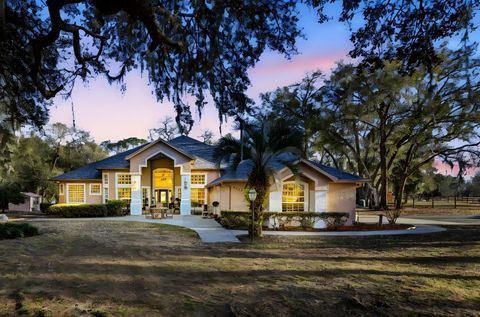 Photo of 6197 Lake Winona Road, De Leon Springs, FL 32130 (MLS # V4947408)