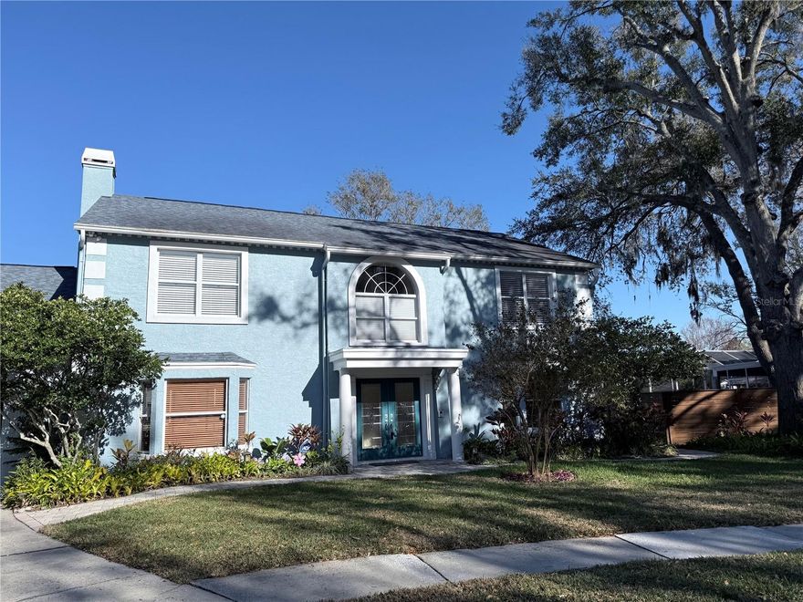 Welcome to this stunning 5 bedroom 3 full bath 2 half bath lakefront pool home located in the highly desirable Lake Magdalene area of Tampa, Florida! No HOA!! This spacious property has over 4,000 square feet of living space and sits on a large .74 acre lot with lush landscaping. As you enter the home you are greeted by a grand foyer that leads into a formal living room and dining area with beautiful travertine and Brazilian Cherry hardwood floors and abundant natural light. The kitchen is a chef’s dream with granite countertops, stainless steel appliances and a breakfast bar and nook. If the dining room, nook or bar don’t fit your mood, take your meal out on the covered lanai, or out on the deck for a mid-day vitamin D boost — so many possibilities. Enjoy binging your favorite shows or movies in your very own media room nestled away on the second floor above the garage. With ample room for seating, invite the gang for a movie marathon, or snuggle with your significant other while watching your favorite rom com. The first floor master suite is a true retreat, with a walk-in closet, an en-suite bathroom featuring dual vanities, a soaking tub, a separate shower and direct access to the lanai. The other four bedrooms(upstairs), centered around an impressive bonus area overlooking the lake, are generously sized and perfect for a growing family or guests. Many updates over the last few years, including but not limited to new roof 12/2019, sea wall rebuilt 2019; and deck 2024. Don’t miss your chance to own this water front oasis with gorgeous, serene lake views. Relax on the dock or use the boat ramp to push off in a kayak for a leisurely sunrise paddle on 350 acre Lake Magdalene. Just think about all the ways to enjoy owning a home like this and schedule a showing today! Seller motivated.