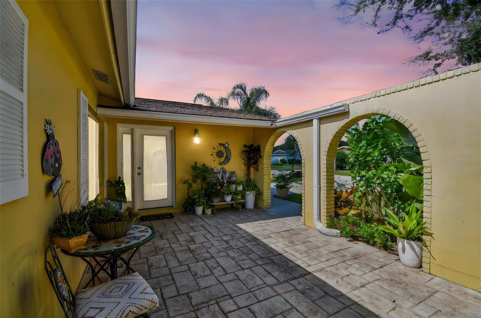 Welcome to this beautiful well-maintained 3-bedroom, 2-bath,2-car garage pool home located in a highly sought-after neighborhood just minutes from charming downtown Dunedin. Step inside to an open split floor plan that's perfect for modern living. The kitchen features granite counter tops, stainless steel appliances, recessed lighting, and plenty of space for cooking. The home also features a spacious Florida room that provides extra living space - perfect for entertaining or relaxing. The split floor plan ensures privacy, and both bathrooms have been tastefully updated. Outside, enjoy your private oasis with a sparkling pool surrounded by beautiful pavers, a fully fenced in backyard, and a charming front patio. The extended driveway (2021) offers extra parking for guests and toys.The home offers peace of mind and style. Wood-like tile flooring throughout was added in 2020, Brand new HVAC (2025), Brand new flat roof (2025), Updated plumbing (2025), Updated electrical panel (2020), Water Heater (2020), pavers all throughout the backyard pool area (2021), and solar panels paid off (2020). No flooding or damage during last year's storms-just peace of mind and prime Florida living! Close to shopping, restaurants, entertainment, award-winning beaches, downtown Dunedin, and only 30 minutes from Tampa International Airport. Schedule your showing today!