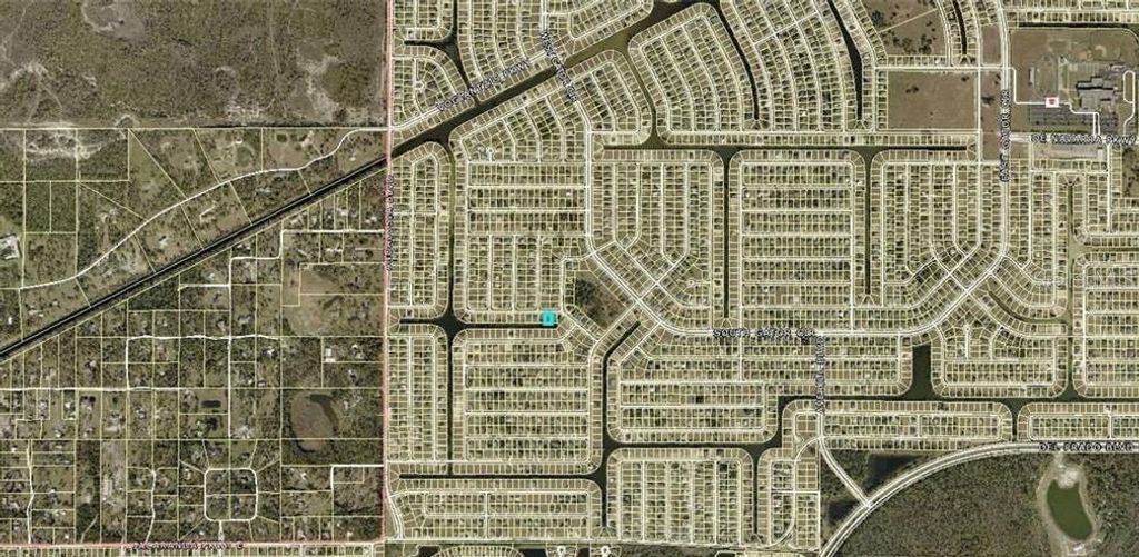 Photo of 1104 NE 34th Lane, Cape Coral, FL 33909 (MLS # C7526121)