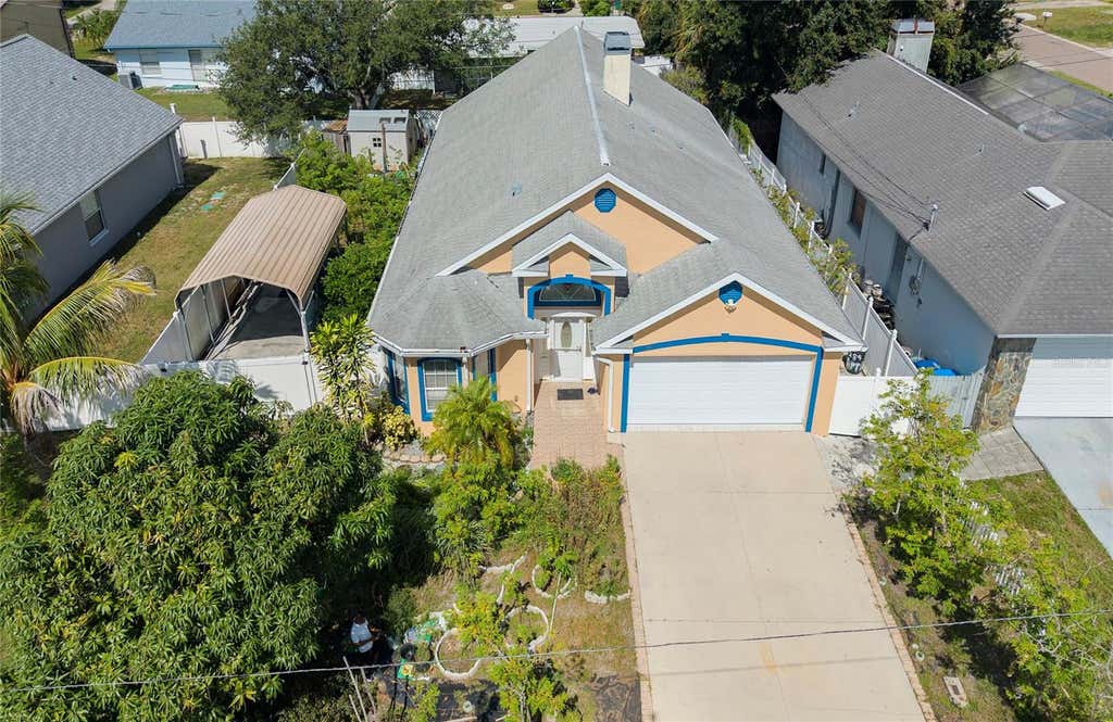 Photo of 1150 Oakwood Drive, Dunedin, FL 34698 (MLS # TB8539860)