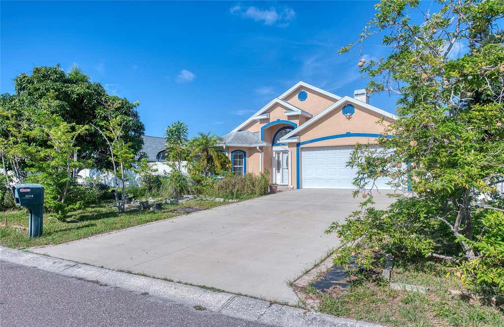Photo of 1150 Oakwood Drive, Dunedin, FL 34698 (MLS # TB8539860)