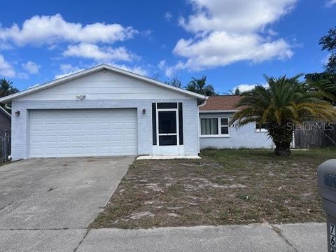 Photo of 7607 Bramblewood Drive, Port Richey, FL 34668 (MLS # TB8483433)