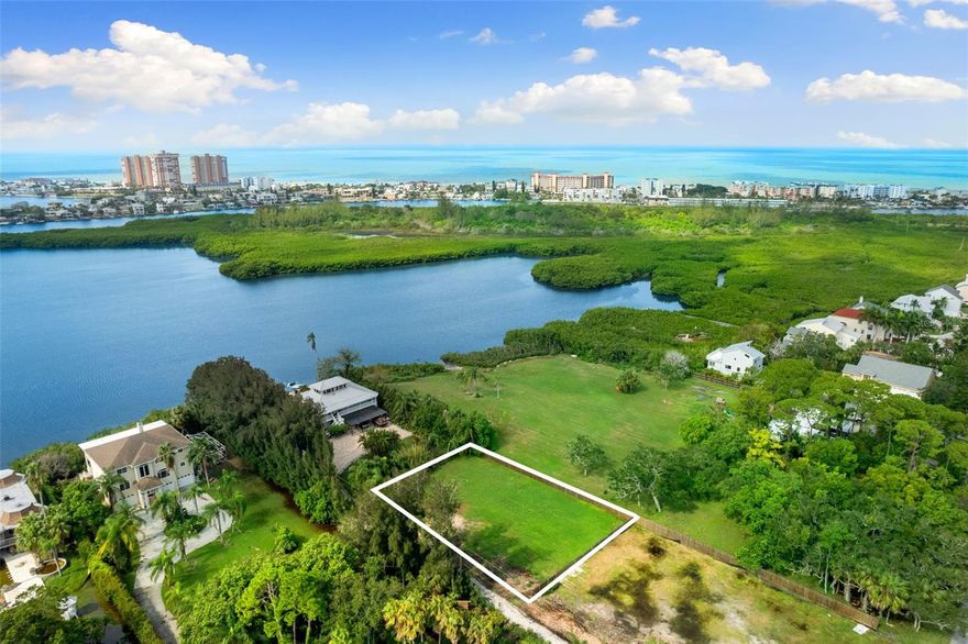 Discover the perfect blend of convenience and opportunity with this pristine .30-acre vacant lot with water view opportunities in the heart of Seminole. Imagine the possibilities as you design a custom sanctuary tailored to your every need, all in a location that puts the best of Tampa Bay at your fingertips. Centrally located just minutes from top-notch shopping/dining, parks, and the serene shores of the Gulf beaches, this lot offers the ultimate Florida lifestyle. Plus, with quick access to both Tampa International and St. Pete-Clearwater airports, whether you’re jetting off for business or welcoming guests, travel is a breeze. This is more than just a piece of land; it’s a gateway to the life you’ve always dreamed of living. If you’ve dreamed of building a cozy retreat or a spacious family haven, this prime piece of land offers endless opportunities for your vision to come to life. Complete building plans, soil tests & survey available.