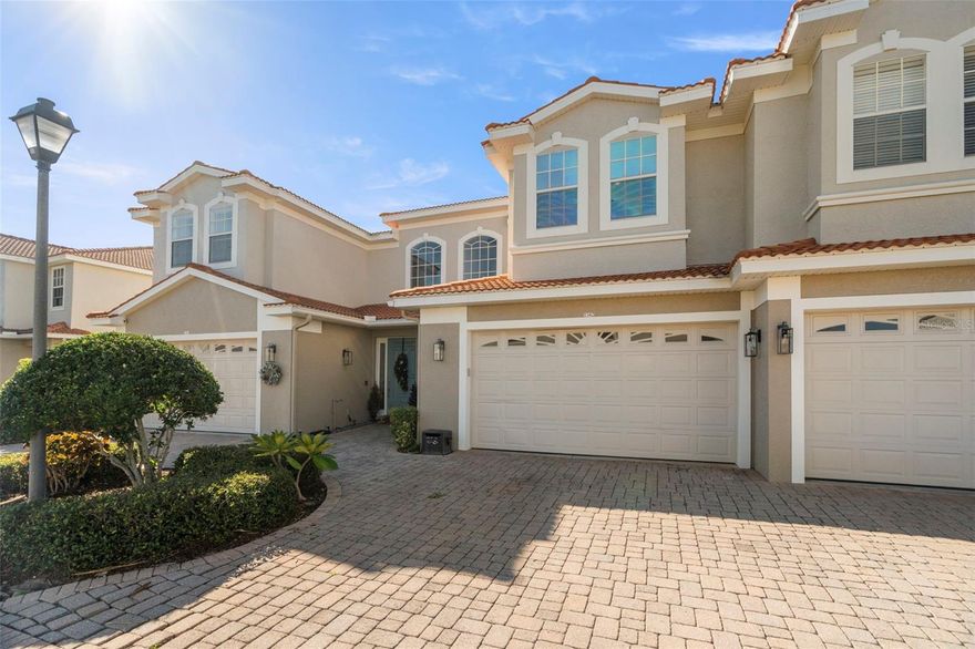 Nestled within the gated community of Villas of San Marino, this beautifully maintained 3-bedroom 3 full bathroom home with 2,342 sq. ft. Bellini model offers an impressive blend of luxury, comfort, and thoughtful design. The grand foyer and staircase greet you with soaring 22-foot ceilings and 8-foot doors throughout the home. The two bedrooms upstairs are true ensuites, (primary and bedroom 2) The expansive upstairs primary suite includes a versatile sitting/office area and direct access to a private balcony. The custom-designed walk-in closet provides exceptional organization with built-in drawers, shelving, and tailored hanging space. The upgraded primary bathroom has a modern freestanding soaking tub, dual vanities and linen closet, and a large frameless glass shower. The second upstairs bedroom is bright and spacious, with its own upgraded bathroom featuring a frameless glass shower and another customized closet accessible through sliding mirrored doors. The laundry room is also conveniently located on the second floor and includes additional cabinetry for ample storage. The kitchen is designed for functionality and style, complete with stainless steel appliances, granite countertops, an island, and a well-organized walk-in pantry. Engineered hardwood floors flow through the main living area downstairs, pairing beautifully with the elegant wood-and-wrought-iron staircase. The downstairs bedroom (bedroom 3) and full bath are thoughtfully arranged with a small foyer between them, and a pocket door allows this area to be fully closed off for added privacy. Great for guests or extended family. Located directly on the Pinellas Trail, within a sought-after school district, and minutes from beaches, downtown Palm Harbor, Ozona, and shopping, this home offers luxury living in one of the area’s most desirable communities in Palm Harbor.
