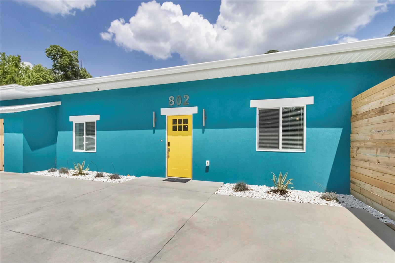 Modern, Fully Renovated Home – Sold Fully Furnished!
Welcome to this beautifully updated property, thoughtfully renovated from top to bottom in 2023–2024. Every detail has been addressed, including all new electrical, plumbing, mechanical systems, and a complete interior transformation. With durability and low maintenance at its core, this home is built to stand the test of time.
The heart of the home features a bright, open-concept living space and kitchen, for both everyday living and effortless entertaining. Whether you’re hosting friends or enjoying family time, the seamless flow makes this home warm and inviting.
Retreat to the luxurious primary suite, which boasts a massive en suite bathroom complete with a soaking tub, double vanities, and a spa-inspired rain shower. It’s a true sanctuary designed for comfort and relaxation.
Step outside to your maintenance-free, fully fenced yard, finished with astro turf, a built-in gas grill, and a cozy gas fire pit— great for year-round enjoyment and entertaining.
Practicality meets convenience with parking for up to six cars plus an EV charger, ensuring both guests and modern living needs are fully accommodated. This home is steps to the rails to trails bike path, walking distance to depot park and downtown Gainesville, and eco friendly.
Throughout the home, you’ll find indestructible terrazo like flooring, contemporary finishes, and a bright, airy layout that make the property both stylish and highly functional. Designed for flexibility, it’s a great fit for a family residence, a fully furnished rental, or even a student rental investment property.
This home is being sold fully furnished, making it a truly turnkey opportunity. Whether you’re moving in or adding to your portfolio, everything you need is already in place. Don’t miss out on this unique combination of modern renovation, open-concept living, luxury finishes, and outdoor lifestyle upgrades. This opportunity won’t last!