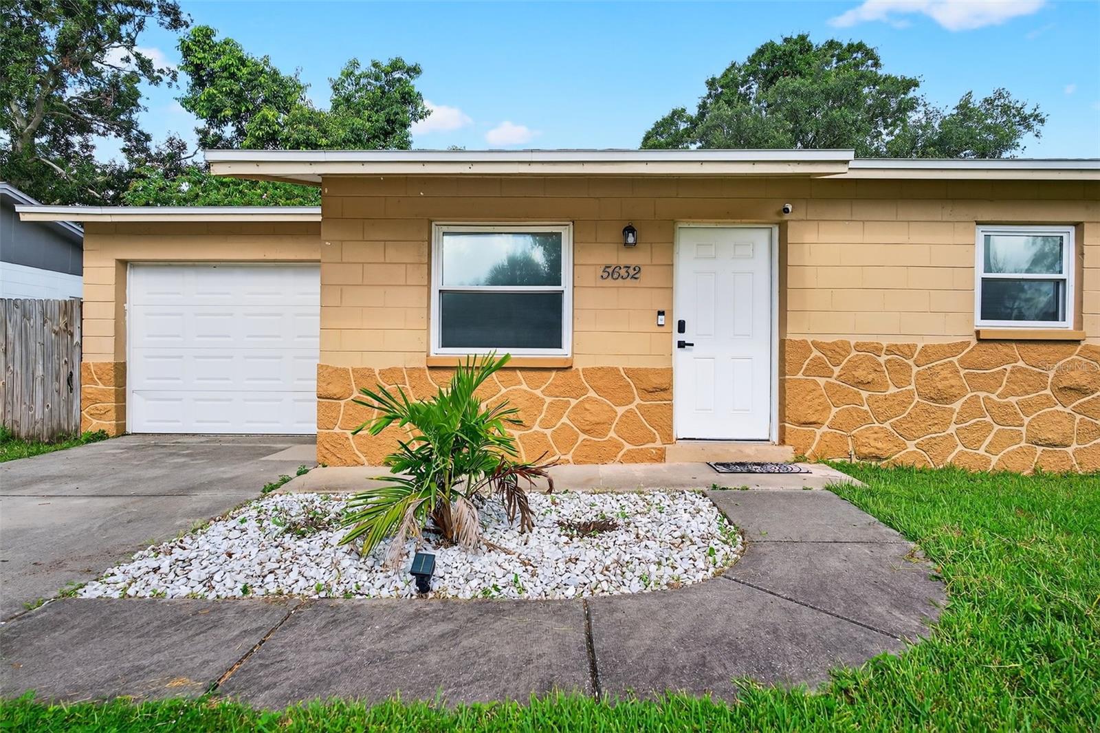 Welcome to 5632 62nd St N, a stylishly updated home in the heart of Jefferson Manor in St. Petersburg. This 3-bedroom, 1-bathroom residence offers the perfect mix of modern comfort and everyday convenience, just minutes from Florida’s top-rated beaches, the energy of Downtown St. Pete, local restaurants, and shopping. Inside, an open-concept layout connects the living room, dining area, and renovated kitchen, creating a welcoming space ideal for both daily living and entertaining. The kitchen has been thoughtfully updated with modern finishes and newer appliances, making it as functional as it is beautiful.
All three bedrooms are located on the east wing of the home, with the primary bedroom privately tucked away toward the back. The home also features a spacious laundry room directly off the kitchen for added convenience. Major upgrades include a newly installed HVAC duct system, an updated electric panel, and upgraded windows that enhance energy efficiency. You'll also find upgraded ceiling fans throughout the home for added comfort. Outside, the large fully fenced backyard offers a blank canvas for your outdoor vision, complete with a concrete pad ready for your dream patio, firepit, or entertaining area.
With its updated systems, prime location, and inviting design, this home is an ideal fit for first-time buyers, downsizers, or anyone seeking a laid-back Florida lifestyle. Don’t miss your chance to call this beautifully remodeled home your own. Schedule your private showing today.