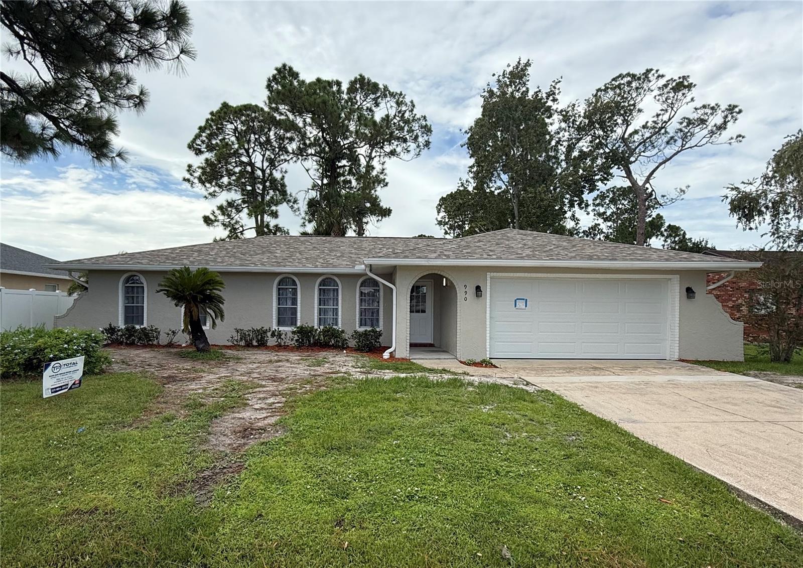 Are you looking for concrete home with NO HOA?. Ready to move freshly updated house in Palm Bay Area, Brand new roof 2025. Spacious house 3 bedrooms, 2 bathrooms. Gorgeous Kitchen and bathrooms with quartz counter tops and stainless steels. Two car garage. Sellers just convert to public sewer 2025. Brand new Vinyl floors with baseboards 5 1/4. Central location close to shopping plazas, restaurants, schools, I-95 and much more. Do not miss the opportunity to make this house your home!