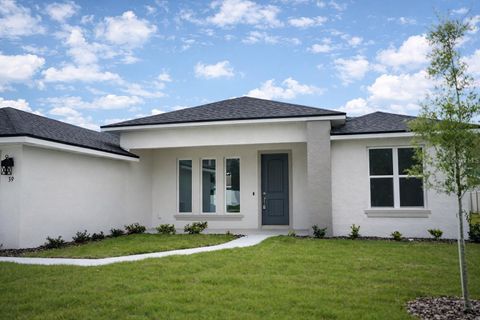 Photo of 15 Bud Shire Lane, Palm Coast, FL 32137 (MLS # FC317873)