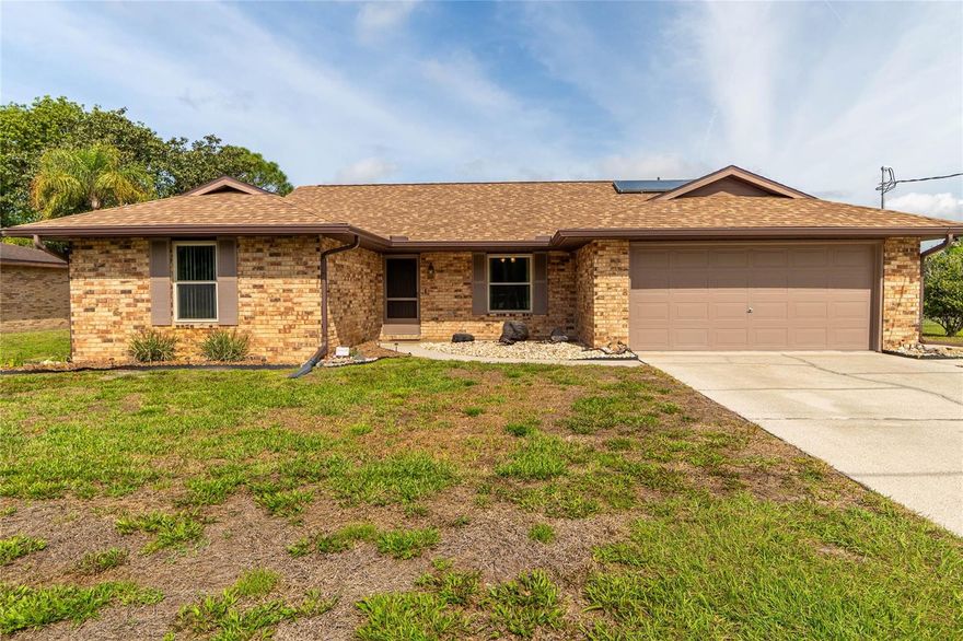 Rare waterfront opportunity in Deltona Lakes! Where else can you find this much value, a massive lot, and direct water access at this price point? This 3-bedroom, 2-bathroom home sits on an oversized 0.35-acre lot that backs directly up to a portion of Lake Theresa, offering incredible versatility and the peaceful lake lifestyle you’ve been searching for. Buy with total peace of mind knowing your major "big-ticket" items have been recently addressed: a brand-new Roof was installed in 2023, the HVAC system was replaced in 2022, and the energy-efficient windows and sliding glass doors are only 5 years old. Inside, you’ll find newly installed flooring throughout the living spaces and a great layout perfect for the next owner to make it their own. The backyard provides endless possibilities for outdoor living, gardening, or storing your toys with no HOA restrictions. This home combines the rare trifecta of modern updates, a sizable waterfront lot, and unbeatable affordability.