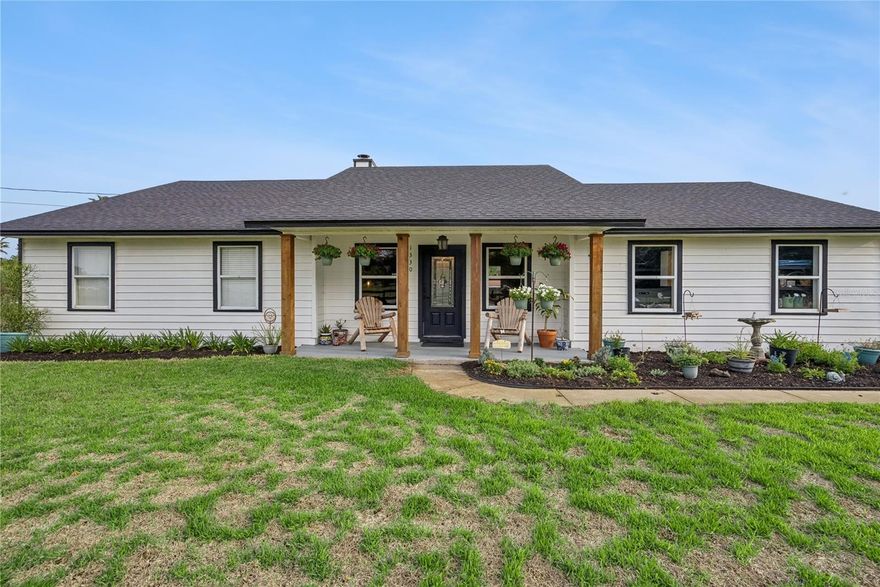 Welcome to your private slice of country living with modern comforts. Nestled on over five fully fenced acres, this beautifully maintained 3 bedroom, 2 bath ranch style home offers the perfect blend of functionality, charm, and outdoor freedom. With 1,617 square feet of living space under air, the home has been thoughtfully remodeled, with owners investing nearly $80,000 in updates, creating a move in ready retreat that feels both warm and refined. Inside, you’ll find engineered wood flooring throughout and a well appointed galley style kitchen featuring stainless steel appliances, ideal for both everyday living and entertaining. A separate indoor utility room with washer and dryer adds convenience, while the spacious family room opens through French doors to a large covered and screened porch, seamlessly blending indoor and outdoor living. The primary suite is generously sized and also offers French door access to the covered porch, creating a peaceful escape. The primary bathroom includes a separate soaking tub and walk in shower, while the guest bathroom features a walk in tub, providing enhanced accessibility. Two additional bedrooms are comfortably sized and include coat closets for ample storage. Outside, the property truly shines. Equestrian enthusiasts will appreciate the two stall horse barn complete with feed room, tack room, and wash rack, all topped with a newer barn roof. A long private right of way runs along the right side of the property, offering easy access from front to back. The two car garage and extended driveway provide plenty of parking and storage options. The grounds are freshly landscaped and fully enclosed with a wood fence, offering privacy and peace of mind. Toward the rear of the property, you’ll find a serene pond and wooded area, home to abundant wildlife including deer, creating a tranquil natural setting. Adding further value, the home’s shingle roof is only two years old, ensuring durability and reduced maintenance for years to come. Located off State Rd 419, you are just minutes from Oviedo and the 408. Highly rated Seminole County schools, UCF and Seminole State college are also nearby. Easy access to the Space Coast in under 45 minutes. Hiking trails, parks and lots of outdoor activities are nearby and waiting to be explored. Ideal for buyers seeking acreage, privacy, and equestrian amenities, this move in ready ranch home with a barn, pond, and extensive upgrades offers the perfect balance of country living and modern comfort.