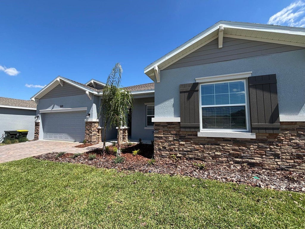 Photo of 5996 Shavasana Road #B, Clermont, FL 34714 (MLS # O6451402)