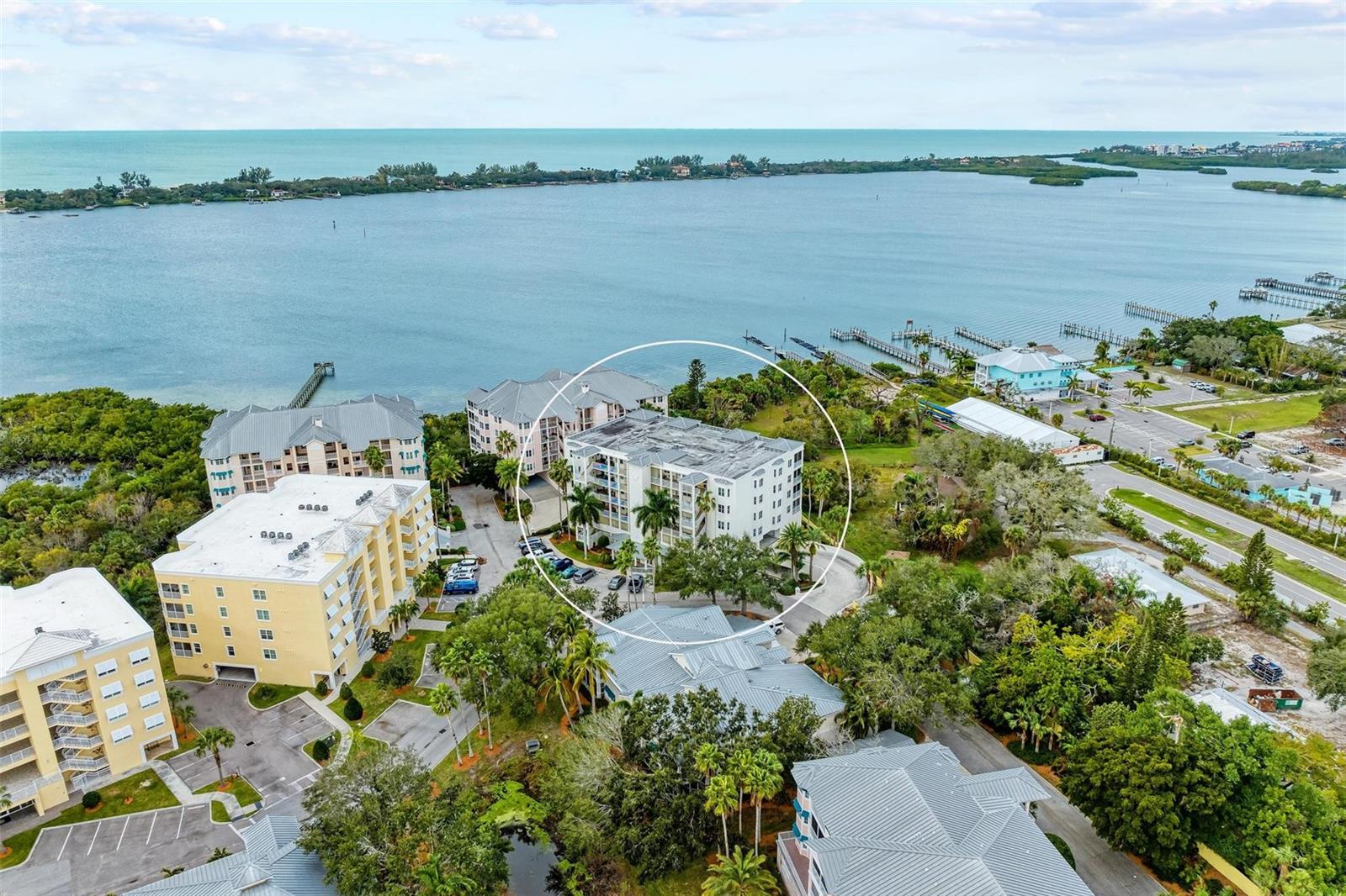 This condominium has it all! Fantastic water views along the Intracoastal. Amazing sunsets from the large balcony. A private two-car garage. Three bedrooms, three full baths and 2,000 square feet of living area. The building has a new roof. The elevator was just replaced. Priced at $599,000. In the Hidden Bay community in Osprey with water views of Little Sarasota Bay and the Intracoastal Waterway, this stunning corner unit comes with a private two-car garage. The unit offers 2,000 square feet of living area with three full bedroom suites with en-suite baths for privacy and convenience. The spacious balcony has screens and sliding doors to the outside and offers room for dining and relaxing, overlooking greenery and the Intracoastal Waterway. The gated resort-style community Hidden Bay offers a heated pool and spa, a grass-thatched tiki hut with grilling stations, a lighted tennis court plus two lighted pickleball courts. For water lovers, there is a kayak launch and a 500-yard elevated boardwalk that winds through lush mangroves. The beautifully renovated clubhouse features a catering kitchen with countertop seating, a fully stocked reading library and a fitness room. The location combines a peaceful, gated waterfront community with convenient access to nearby shopping, dining, recreation and only eight miles to Siesta Key, consistently ranked as one of the best beaches in the U.S. For cycling enthusiasts, the nearby Legacy Trail offers 20-plus miles of scenic, paved biking trails.