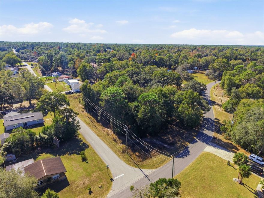 This desirable 0.47± acre wooded homesite is located in the established Rainbow’s Inn Golf neighborhood, offering an excellent opportunity to build in a growing area surrounded by newer construction homes while enjoying a quiet, natural setting. Comprised of two lots sold together and not available individually, the property provides added space, flexibility, and value for a future homesite or investment. Zoned R-1, the parcel is well suited for residential development and features a wooded landscape that allows you to design your homesite while maintaining privacy and character. Fronting a paved road, the property offers convenient access while preserving a peaceful neighborhood atmosphere. With no HOA, proximity to Dunnellon, the Rainbow River, local shopping, dining, and outdoor recreation, this property represents a rare opportunity to own land in a well-known golf neighborhood with strong long-term potential—visit the site and imagine the possibilities.