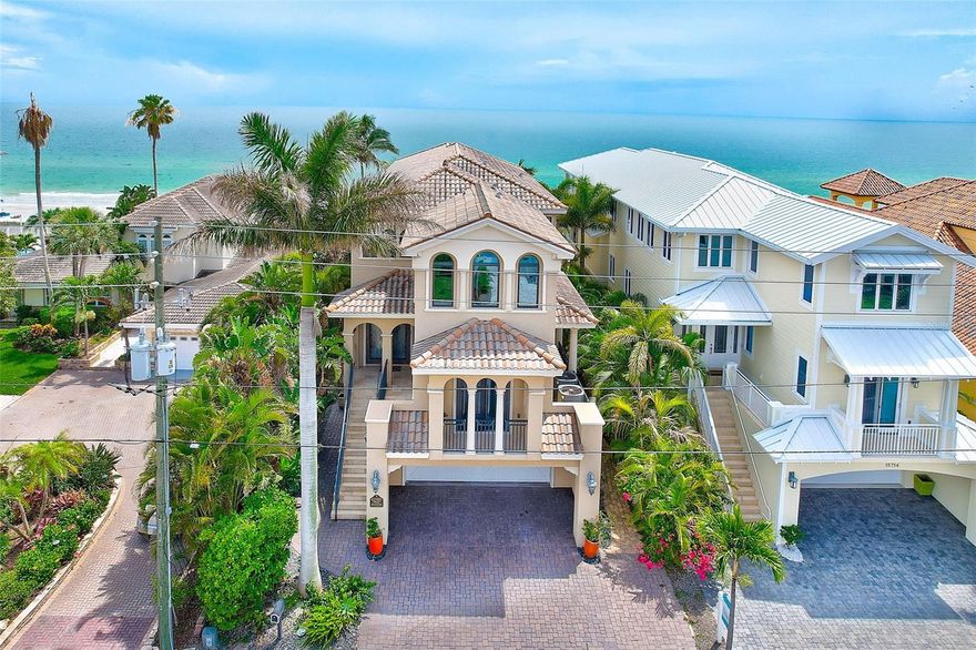 Here it is! Paradise at its Finest!
A Gorgeous Mediterranean Style Single Family home on the shores of Redington Beach overlooking the Gulf Of Mexico. This Stunning Custom Furnished Home has 4 Bedrooms with 5 1/2 baths with every room having its own full bath.
With over 5000 Square feet of living luxury, the three floors all have sweeping views of the Gulf Of Mexico from every level.
The spacious main floor has a custom Gourmet Kitchen with upgraded High end appliances, large walk in pantry, granite countertops, and marble floors.
Enjoy watching your big screen TV by the fireplace while taking in the amazing views of beautiful Redington Beach.
This home comes with a complete Reverse Osmosis Water Filtration System throughout the house.
Walk into your very own Home Theatre with upgraded audio and visual enhancements of 8K technology along with custom made seating.
Spend time sipping wine in a specialized wine tasting area that has over 100 rare and unique wines from all over the world.
The Master Suite Has its own Private balcony to enjoy the panoramic views of the Gulf Of Mexico.  Enjoy sunsets from an Luxurious oversized sitting area that leads into double vanities and Custom Wood Cabinetry throughout the Master Bath.
The First Floor level has an oversize garage that can fit up to 5 cars and opens up directly to the Custom Salt Water Pool and Heated Spa
to walk directly to the sandy shores of Redington Beach.
The home is equipped with a State of the Art Security system and an Elevator to all floors. Included is a Home Warranty covering all appliances and the Custom in house Generator System. 
Just Imagine Yourself in these Photos!
This in Demand Property is Priced under market to sell!  Schedule a private showing today!