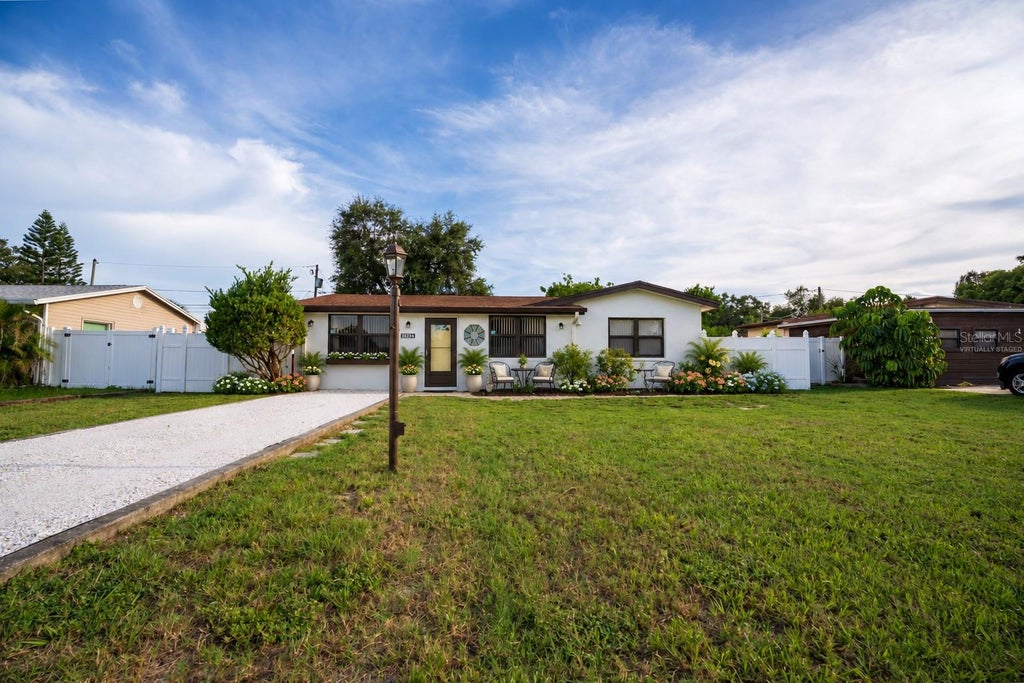 Photo of 10294 54th Avenue N, St Petersburg, FL 33708 (MLS # TB8546660)