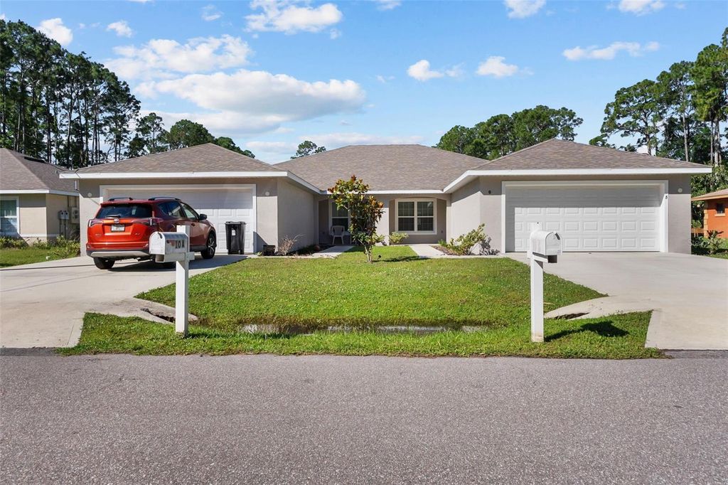 Photo of 10 Pontiac Lane #A and B, Palm Coast, FL 32164 (MLS # O6408520)