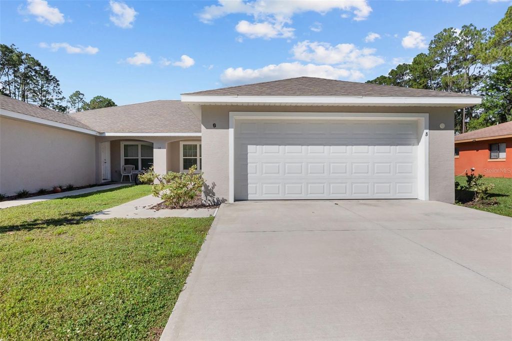 Photo of 10 Pontiac Lane #A and B, Palm Coast, FL 32164 (MLS # O6408520)