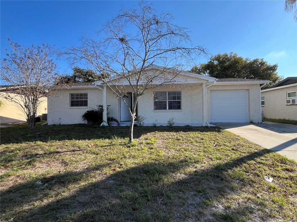 Photo of 9504 Richwood Lane, Port Richey, FL 34668 (MLS # TB8459010)