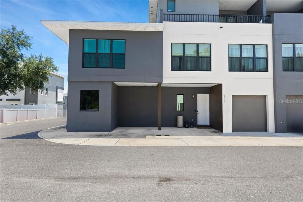 Photo of 8723 Palm Ranches Place, Tampa, FL 33614 (MLS # TB8382751)