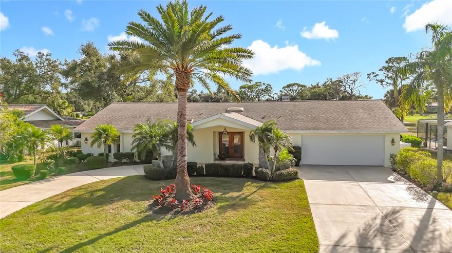 One or more photo(s) has been virtually staged. **COUNTRY CLUB OF SARASOTA** – Now affiliated with the Sarasota Sports Club, which is undergoing exciting improvements! Not included in the HOA Fee. A separate membership will be required. 

This charming home is nestled in a picturesque neighborhood with beautiful views. The spacious kitchen features ample wood cabinetry and overlooks the lush golf course, making meal prep a delight. Two generously sized living rooms on either end provide a warm and inviting space, complete with a cozy fireplace.

The primary bedroom, located on the left, offers a large walk-in closet, while two additional bedrooms on the opposite side ensure comfort for family or guests. The updated bathroom includes a stylish new vanity, and the laundry room adds extra storage space for convenience.

With elegant marble flooring throughout and hardwood floors in the bedrooms, the home exudes sophistication. An expansive screened lanai invites you to soak up the sun, facing south and overlooking the fairway of the 15th hole. Newer awnings provide added sun protection, and essential updates include a roof replacement in 2015 and new AC and water heater in 2019. A water softening system enhances this home’s appeal.

Schedule your showing today !!!