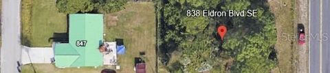 Photo of 838 Eldron Boulevard SE, Palm Bay, FL 32909 (MLS # OM712040)
