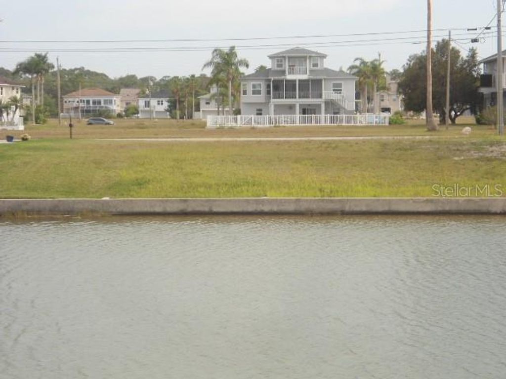Photo of 3415 Triggerfish Drive, Hernando Beach, FL 34607 (MLS # W7875136)