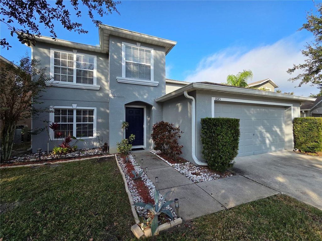 Photo of 1645 Algonkin Loop, Orlando, FL 32828 (MLS # O6366459)
