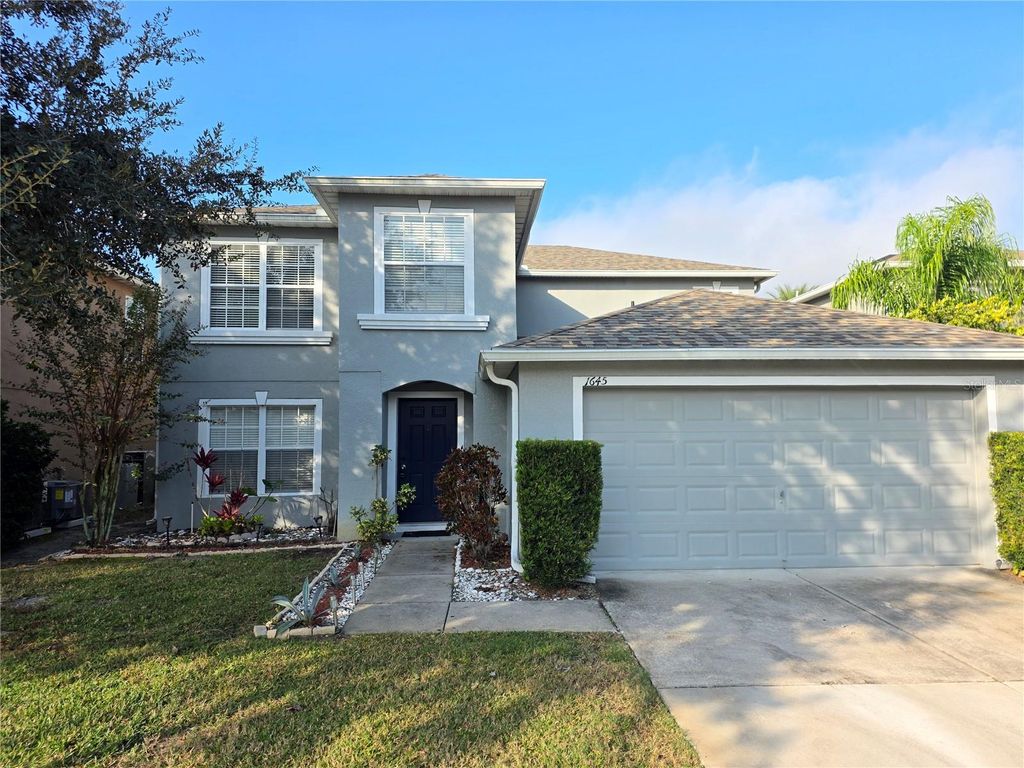 Photo of 1645 Algonkin Loop, Orlando, FL 32828 (MLS # O6366459)