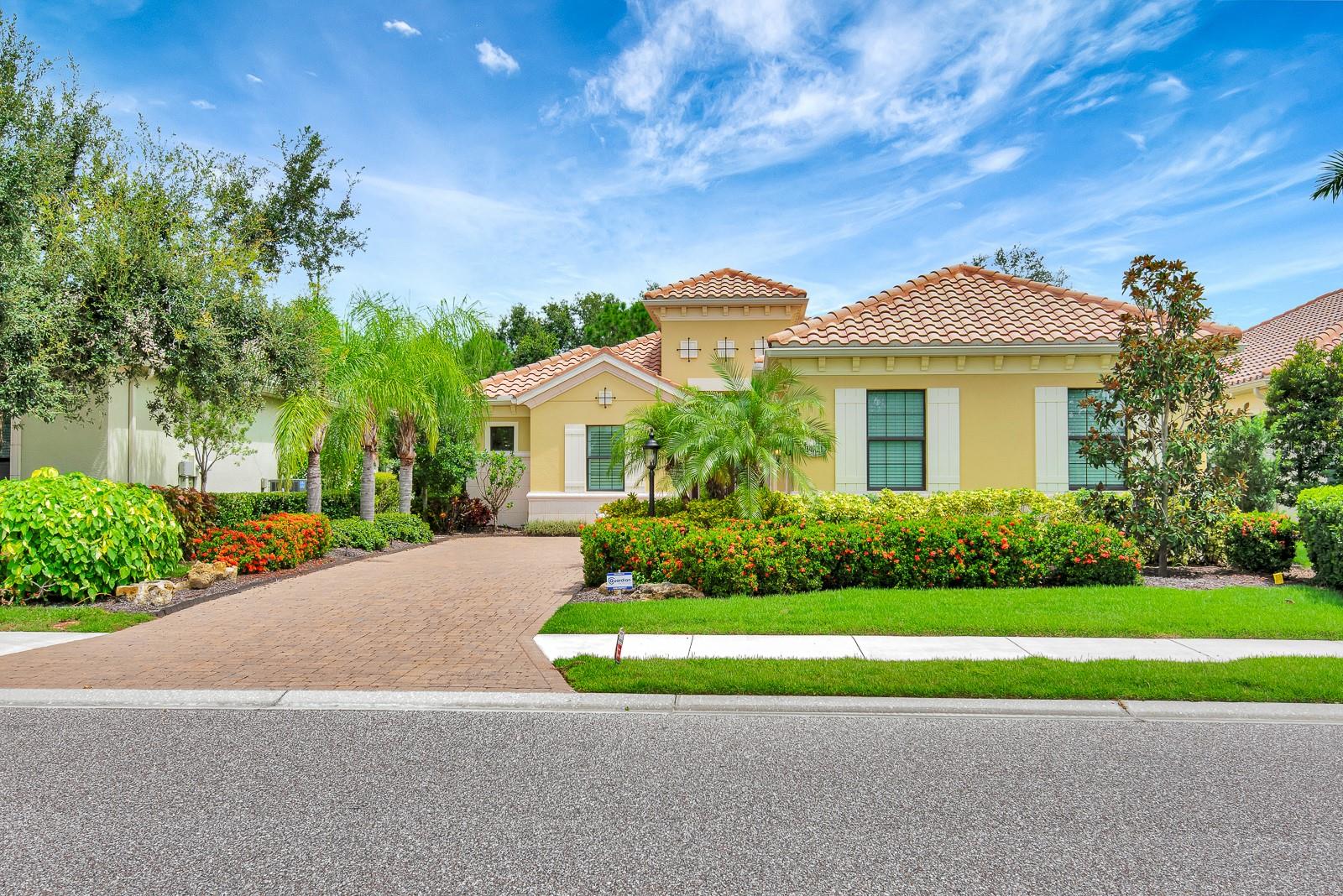 Welcome to Country Club East, where luxury living meets timeless comfort. This beautiful 2,600 sq. ft. home with a 3-car garage, golf cart parking, and an oversized driveway is being offered turn-key furnished. Enjoy privacy on the back patio with serene views of the greenbelt and preserved area.
Inside, the home features an open floor plan with crown molding, tray and coffered ceilings, elegant tile and vinyl flooring. The gourmet kitchen is the heart of the home, showcasing stone countertops, an oversized island, soft-close cabinetry, upgraded lighting, and a large walk-in pantry with a built-in coffee station. The spacious owner's suite is complemented by a luxurious bath, while an additional private office/den with double doors provides excellent flexibility. With 3 bedrooms, 3 bathrooms, and a dedicated office, this home offers both comfort and functionality.
Located near top-rated schools, Lakewood Ranch Main Street, and UTC Town Center, this property combines convenience with elegance. Country Club East is a premier golf community offering three resort-style pools, a clubhouse, and a state-of-the-art fitness center, delivering an upscale lifestyle in the heart of Lakewood Ranch.