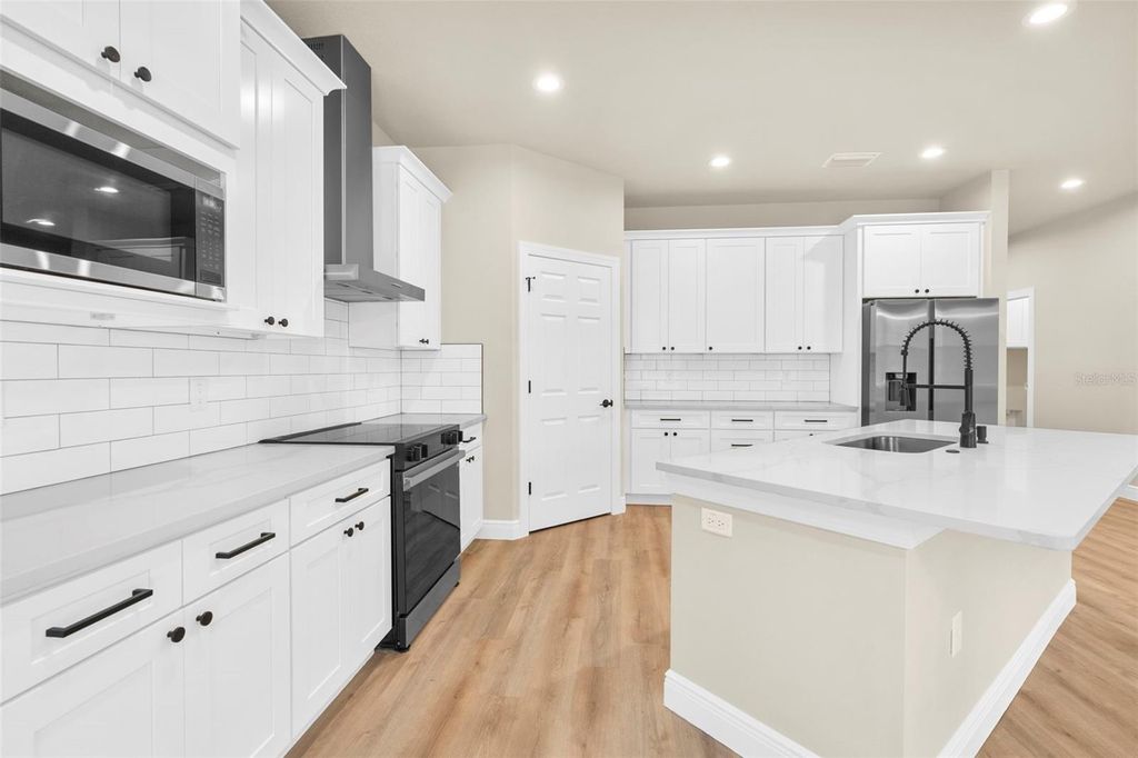 Photo of 17420 Macassar Road, Weeki Wachee, FL 34614 (MLS # W7877370)