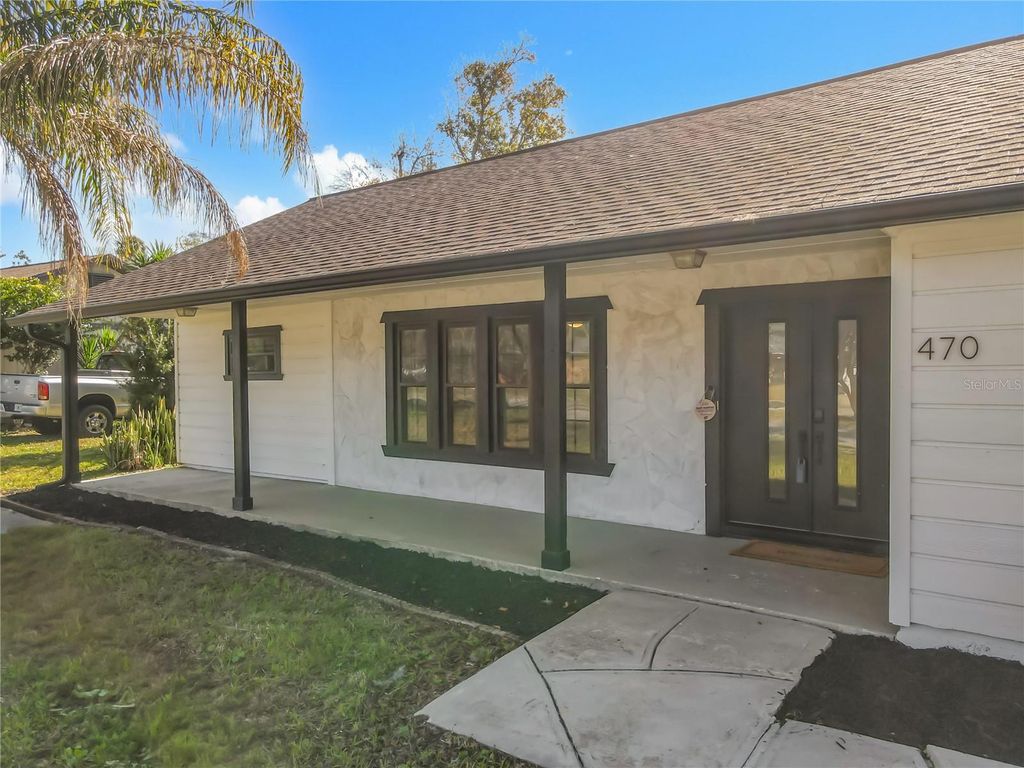 Photo of 470 Merrimac Drive, Port Orange, FL 32127 (MLS # NS1086996)