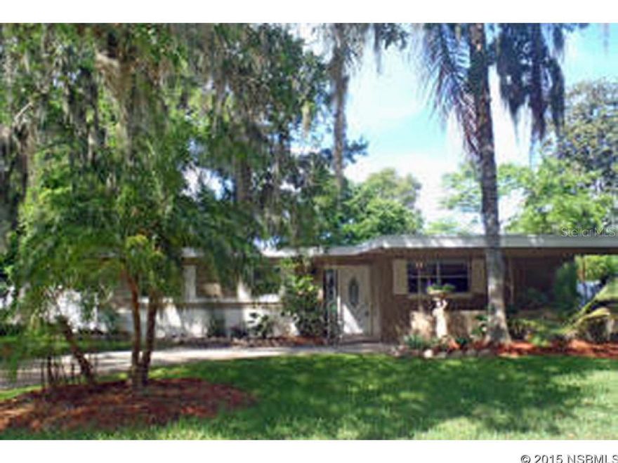 Beautifully remodeled 3 bedroom 2 full bath home in desireable South Daytona...you've got to see this transformation! New, new, new and waiting for you! Open concept living room/dining room combo with kitchen island bar. Custom cabinetry, new countertops, newer appliances. Nothing was missed: new lighting, fans, new six-panel doors throughout, a/c 2 years new, freshly painted, & custom wood blinds at windows. Laminate and tile floors. Inside 11x7 laundry features private washer/dryer area and an open ''mudroom''/optional space for bonus area opening to back yard. From living room, new glass sliders open to covered 20x15 patio with new summer kitchen & relaxing water feature. New roof, fenced yard, beautiful landscaping. Absolutely move-in ready! Appraised at list price. Buyer verify info