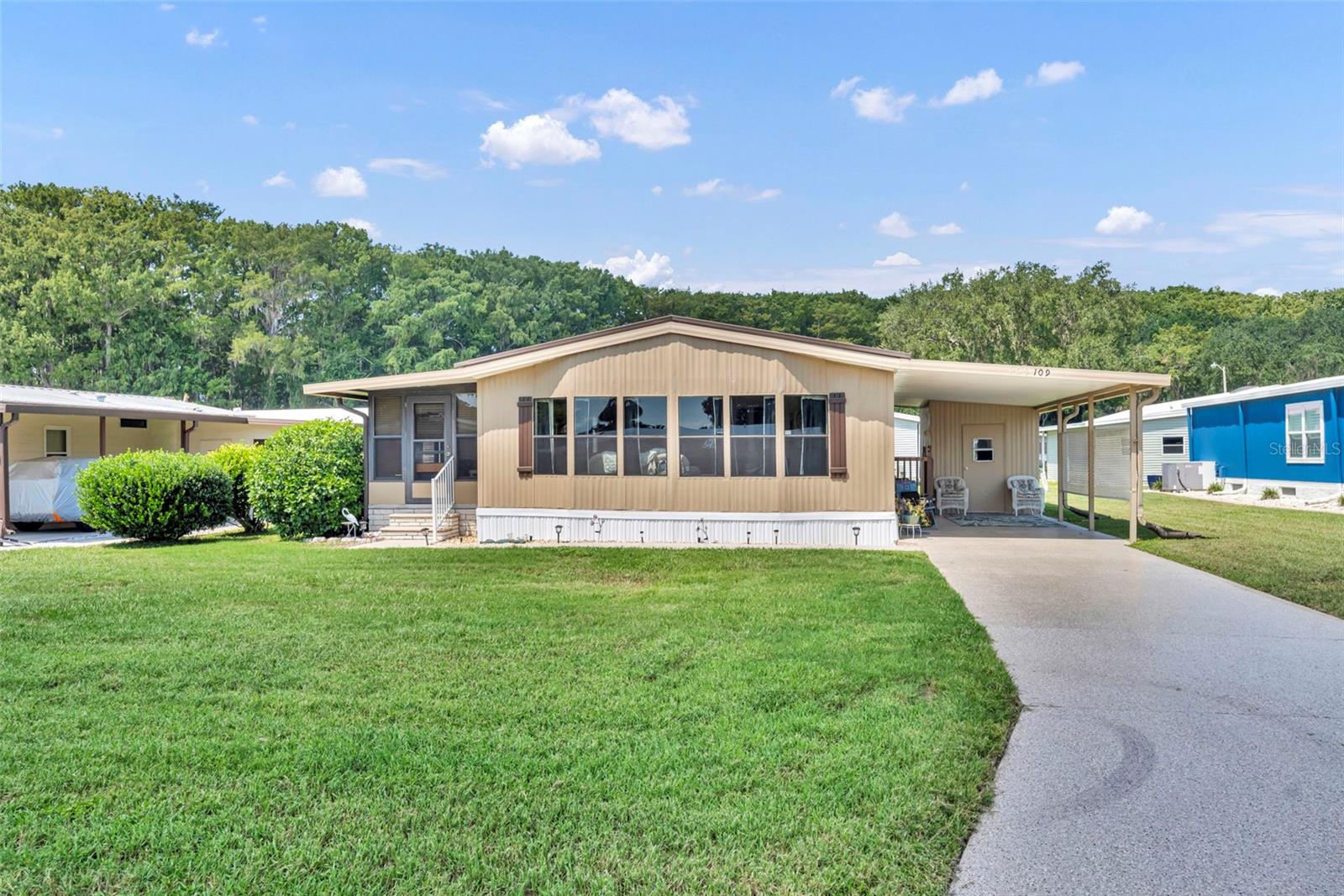 Welcome to 109 Lyonia Lane, Wildwood – Your Florida Lifestyle Awaits!
Discover the perfect blend of comfort, convenience, and active living in this charming 2-bedroom, 2-bath manufactured home with 1,152 sqft of living space, located in the highly sought-after Continental Country Club, a gated 55+ golf course community just minutes from Brownwood Paddock Square and The Villages.
Step inside to find a bright and welcoming floor plan designed for easy living. The spacious living area flows effortlessly into the dining space and kitchen, making it perfect for both quiet evenings and entertaining friends. With two bedrooms and two full baths, this home provides the ideal setup for year-round living or seasonal getaways.
But the true highlight is the lifestyle. Continental Country Club is known for its resort-style amenities, including an 18-hole championship golf course, tennis and pickleball courts, swimming pool, clubhouse, restaurant, and a vibrant calendar of social activities. Whether you love golfing, cards, fitness, or community events, you’ll find it all here.
Outside your doorstep, you’re just minutes from The Villages’ shopping, dining, medical facilities, and nightly entertainment at Brownwood Square. It’s the best of both worlds – a peaceful gated community with easy access to the Villages!!!!
This is more than just a home – it’s a chance to enjoy the Florida lifestyle you’ve always dreamed of.
Don’t miss your opportunity – schedule your private showing today and see why Continental Country Club is one of the area’s best-kept secrets!