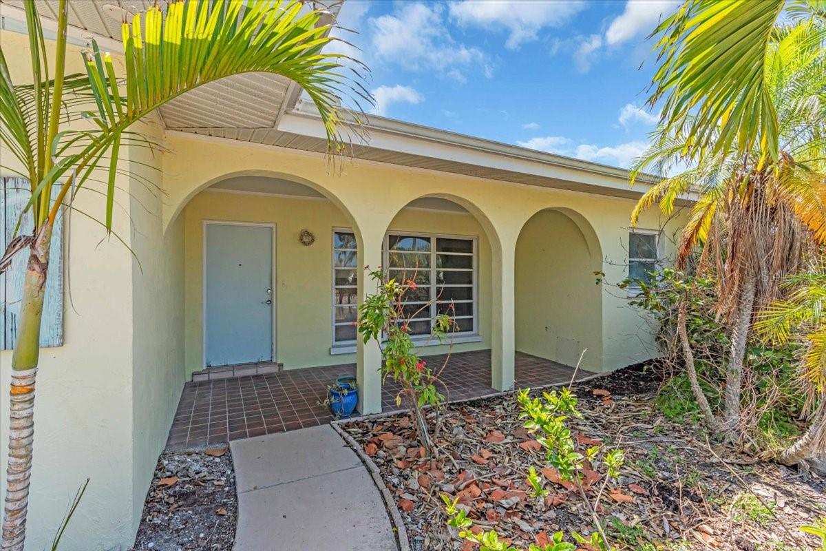 One or more photo(s) has been virtually staged. Welcome to 396 Avenida Madera! Nestled in the heart of the Siesta Key Village and walking distance to world renown Siesta Key Beach presents a rare opportunity to own prime land. The very last lot at the end of a cul-de-sac offers a novel setting for your tranquil escape to over 112 feet of direct saltwater canal access. Having had storm damages from Helene & Milton, seller has professionally remediated the home: selling as is, for land value. Seller's highlights include a new concrete seawall built in 2023. Seller has made your renovation plans easy with optional estimates for completion with which to add your personal touches and preferences. Perhaps you'll agree this prime location is rather the proper ground to start fresh and build a custom waterfront retreat. Wake up to spectacular sunrises on your waterfront porch where you can enjoy morning coffee and tea with views of the canal. A short ten minute walk leaves you in breathless beauty of powdery sands and crystal-clear waters at Siesta Key Beach Access #3. And in the evenings, a five-minute stroll brings you top-rated dining and entertainment. Take advantage of an unparalleled opportunity to live in paradise and own a property that has it all.