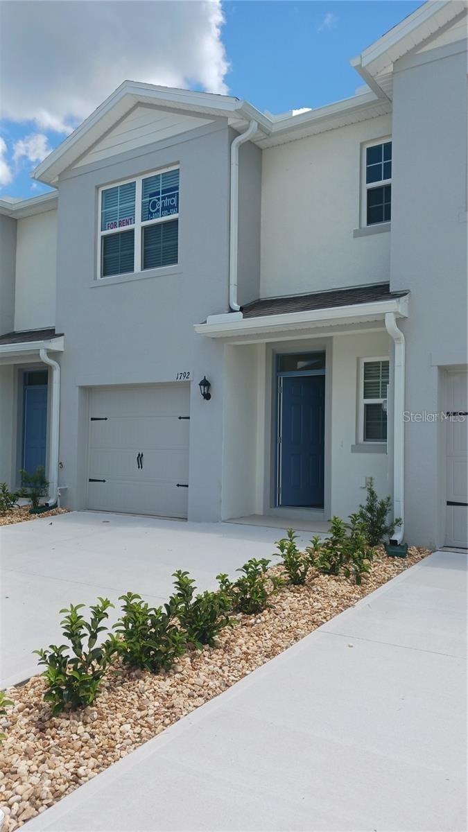 Photo of 1792 Rock Elm Road, Davenport, FL 33837 (MLS # O6448069)