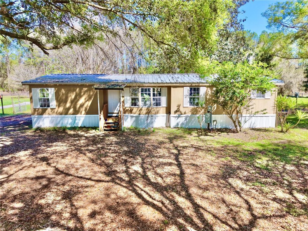 Photo of 7494 Gordon Loop, Brooksville, FL 34601 (MLS # TB8487820)