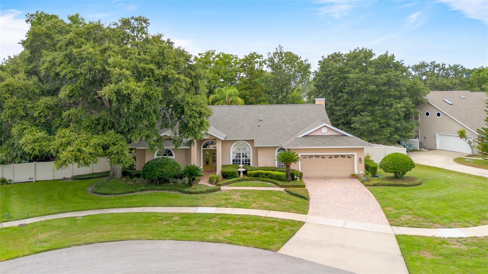 Florida Living at Its Best | Pool Home in Lake Mary Woods
Tucked away on a quiet cul-de-sac and backing to a peaceful nature preserve, 610 Baywood Ct is your private Florida retreat. With 2,377 sq ft of living space, this 4-bed, 2.5-bath home blends comfort, style, and indoor-outdoor living in all the right ways.
Step inside to soaring ceilings, natural light streaming through, and a layout that flows effortlessly. The kitchen opens to the family room perfect for entertaining with granite counters, stainless appliances, center island, wine fridge, and breakfast nook. The living and dining areas are elegant yet relaxed, with crown molding and custom touches throughout.
The spacious primary suite is tucked away for privacy, with a walk-in closet, dual sinks, and a walk-in shower. Two guest bedrooms and a full bath sit on the opposite side of the home for added space and flexibility.
Outside, enjoy a screened saltwater pool and heated spa, surrounded by lush landscaping and total privacy no rear neighbors. Located near top-rated schools, Publix, I-4, dining, shopping, and Lake Mary's best.