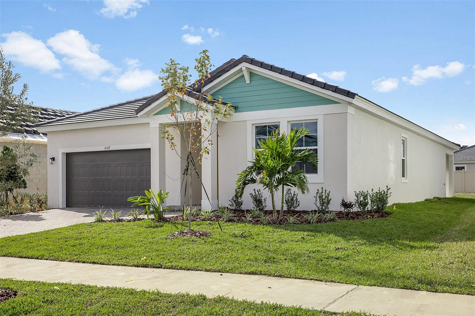 One or more photo(s) has been virtually staged. Under Construction. Check out the Calusa, a single-story home where convenience and style go hand in hand! As you step through the bold, eye-catching elevation and professionally designed landscaping, you'll enter an impressive floor plan featuring 4 bedrooms, 2 bathrooms, and a 2-car garage. The first two bedrooms are accessed through the foyer and are connected by a convenient Jack and Jill bathroom. Continue through the extended foyer to discover an additional bedroom, a well-appointed bathroom, and a spacious laundry room with washer and dryer included. Prepare to be impressed by this kitchen, showcasing 42" upper cabinets, quartz countertops, stainless-steel appliances, and a large center island, all set against luxury vinyl plank flooring. The kitchen flows seamlessly into the expansive living room and the formal dining area which opens to the covered lanai through elegant sliding glass doors. The owner's bathroom is a retreat of its own, featuring a walk-in shower with floor to ceiling tile. Equipped with a smart thermostat for seamless climate control and energy efficiency, the Calusa delivers both cutting-edge comfort and outstanding design.
Close to everyday conveniences and top-rated schools. Stay close to what’s important to you at Hawkstone, a Lithia master-planned community. Located just south of FishHawk Boulevard, residents are minutes away from US-301, I-75, and top-rated schools. Surrounded by breathtaking pond and wetland views, Hawkstone delivers the perfect mix of natural beauty and modern amenities right at your doorstep. Whether you're enjoying the serene scenery or the community perks, this is where you'll want to be. Discover your new home at Hawkstone today!
Images shown are for illustrative purposes only and may differ from actual home. Completion date subject to change.