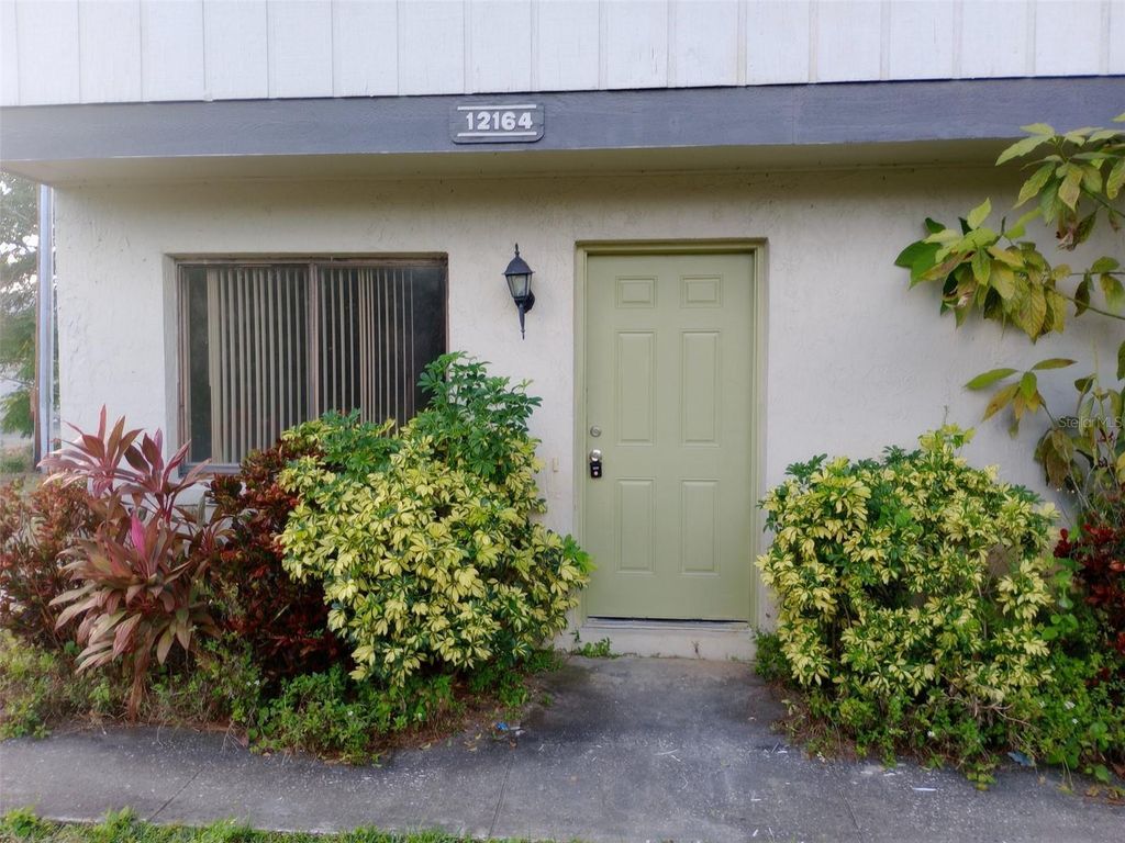Photo of 12164 Pepperdine Place, Orlando, FL 32826 (MLS # O6375976)