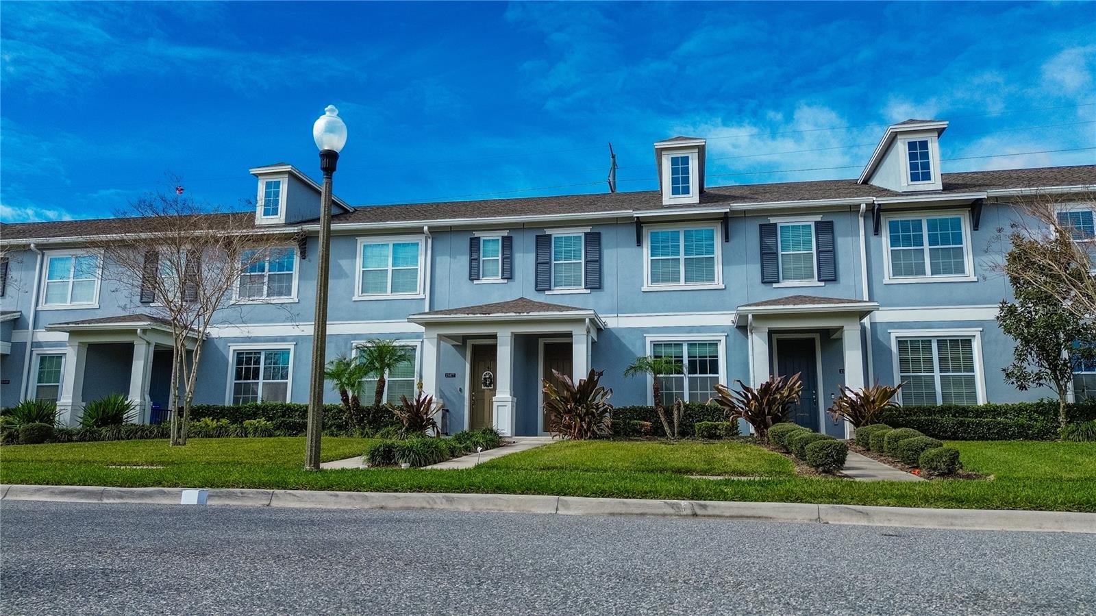 Welcome to 15471 Honeybell Drive, a beautifully designed home in the sought-after Horizon West area of Winter Garden. This property features an open-concept layout with a spacious living and dining area that flows seamlessly into a modern kitchen with stainless steel appliances and ample counter space. Upstairs, you’ll find a luxurious master suite with a walk-in closet and ensuite bath, plus two additional bedrooms and a convenient laundry area. The private, fenced courtyard with pavers is perfect for outdoor entertaining, while the detached two-car garage adds extra storage and functionality. Located just minutes from Hamlin Town Center, you’ll enjoy easy access to shopping, dining, entertainment, and major highways like FL-429 and the Turnpike. The home is zoned for top-rated Orange County schools, including Independence Elementary, Bridgewater Middle, and Horizon High School. Grocery stores, coffee shops, movie theaters, and medical facilities are all within a short drive, making this a truly convenient location.This property is priced to sell, offering phenomenal value compared to similar homes in the area. The community also provides fantastic amenities such as a pool, clubhouse, and playground for residents to enjoy. With its prime location, modern features, and unbeatable price, this home is an incredible find. Schedule your private showing today and make 15471 Honeybell Drive your new home!